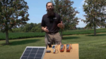 Drew Schiavone demonstrates solar panel installation in a YouTube video